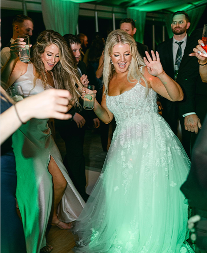 Bride dancing on the wedding reception dance floor with ML Event Entertainment.